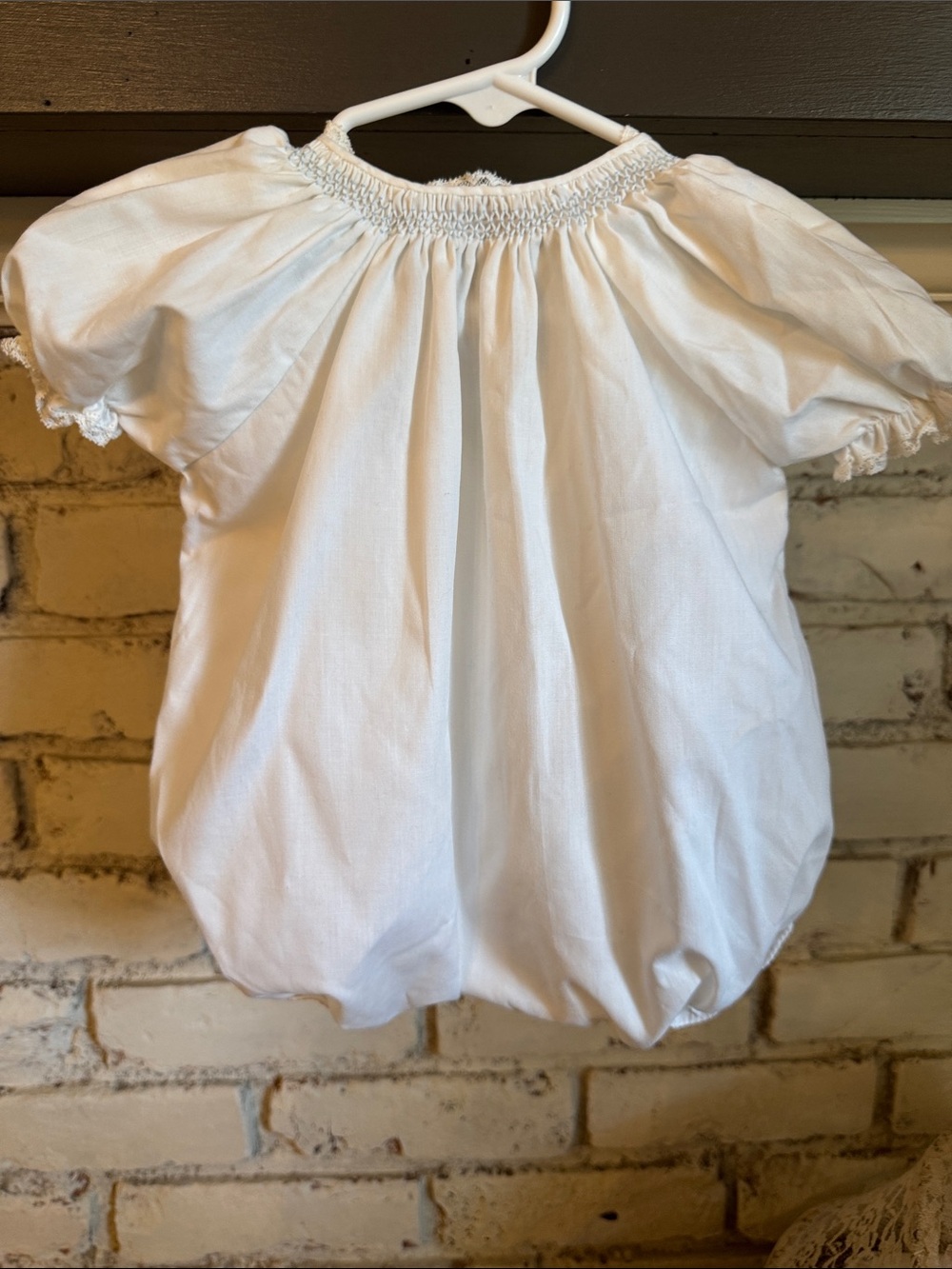 White Smocked newborn one piece hand made.